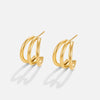 Helena – Pendientes mini circulares dorados con textura.