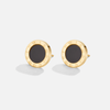 Selina – Aretes redondos con centro negro.