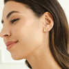 Greta – Pendientes redondos con diseño floral.