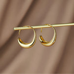 Susanne – Pendientes dorados con textura.