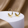 Susanne – Pendientes dorados con textura.
