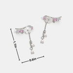 Maren – Pendientes colgantes dorados con perlas.