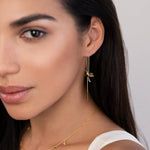 Anillos de oro con un delicado colgante