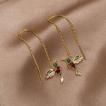 Anillos de oro con un delicado colgante
