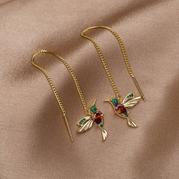Anillos de oro con un delicado colgante
