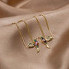 Gold hoops with delicate pendant