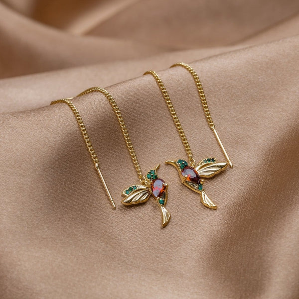 Anillos de oro con un delicado colgante