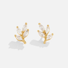 Felicita – Pendientes de oro con detalle de hojas.