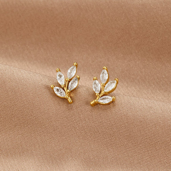 Felicita – Pendientes de oro con detalle de hojas.