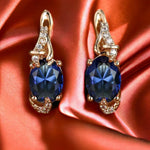 Elina – Pendientes con brillo de zafiro oscuro.