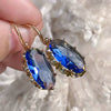 Johana – Anillo de zafiro con engaste brillante.