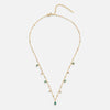 Marta – Collar dorado con colgante verde.
