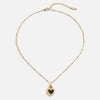 Monika – Colgante en forma de gota en oro cálido.