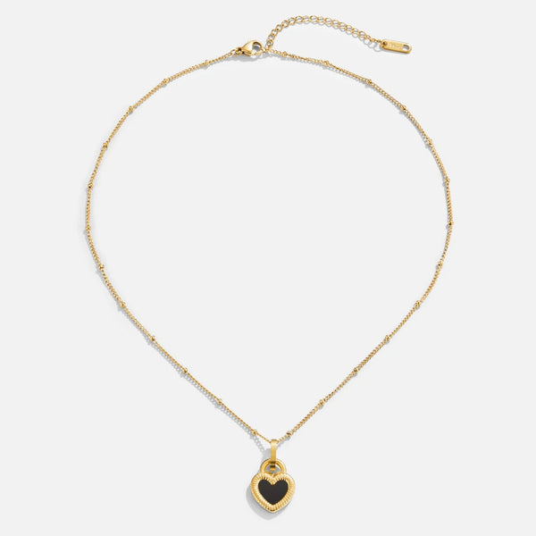 Monika – Colgante en forma de gota en oro cálido.