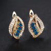 Nora – Pendientes de oro con zafiro y circonio.