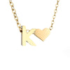 Nina – Collar dorado en forma de V.