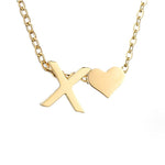 Nina – Collar dorado en forma de V.