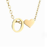 Nina – Collar dorado en forma de V.