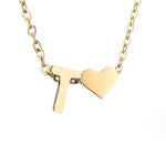 Nina – Collar dorado en forma de V.