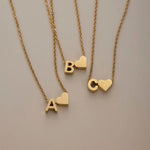 Nina – Collar dorado en forma de V.