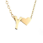 Nina – Collar dorado en forma de V.