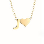 Nina – Collar dorado en forma de V.