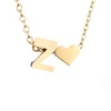 Nina – Collar dorado en forma de V.