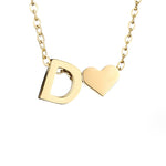 Nina – Collar dorado en forma de V.