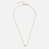 Nina – Collar dorado en forma de V.