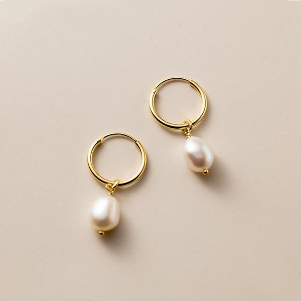 Elisa-Marie – Pendientes dorados con colgante de perla.