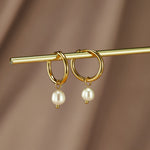 Elisa-Marie – Pendientes dorados con colgante de perla.