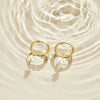Elisa-Marie – Pendientes dorados con colgante de perla.