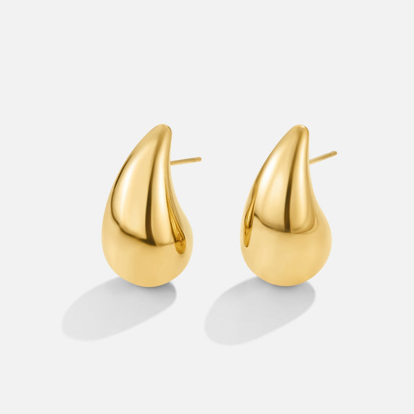 Anja – Pendientes circulares dorados con un suave redondeo