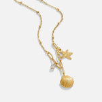 Greta – Collar con colgante de estrella en color dorado.