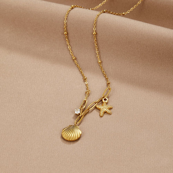 Greta – Collar con colgante de estrella en color dorado.
