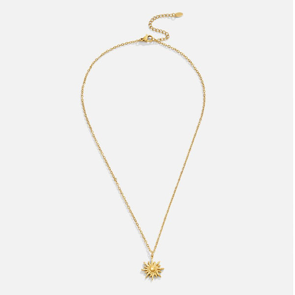 Ronja – Collar dorado con colgante floral.
