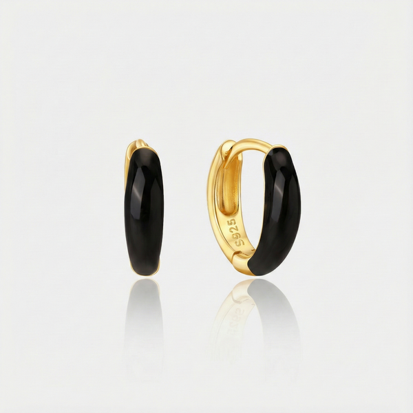 Theresia – Gold earrings with a gentle curve
