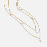 Tanja – Collar dorado de capas con un eslabón moderno.