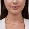 Helga – Collar de dos capas con pequeños detalles de color.
