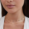 Helga – Collar de dos capas con pequeños detalles de color.