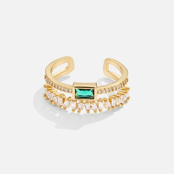 Sabina - Gold ring with emerald green accents.