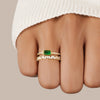 Sabina - Gold ring with emerald green accents.