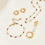 Helmina – Colorful gold chain with enamel accents.