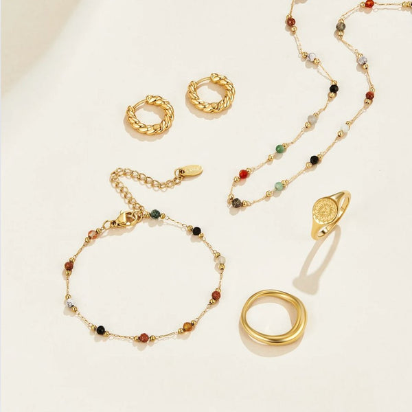 Helmina – Colorful gold chain with enamel accents.