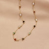 Helmina – Colorful gold chain with enamel accents.