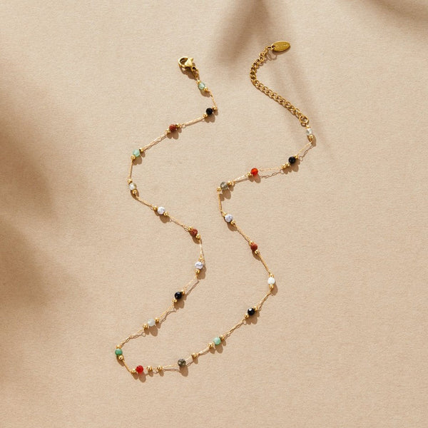 Helmina – Colorful gold chain with enamel accents.
