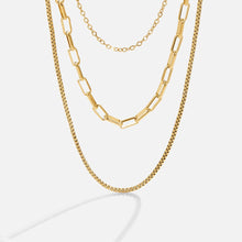 Josefína – Triple-layered gold necklace with delicate links.