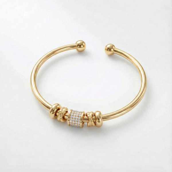 Nina - Adjustable gold bracelet with charms