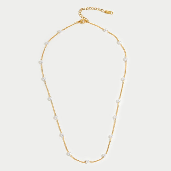 Miriam – Collar dorado con longitud armónica.