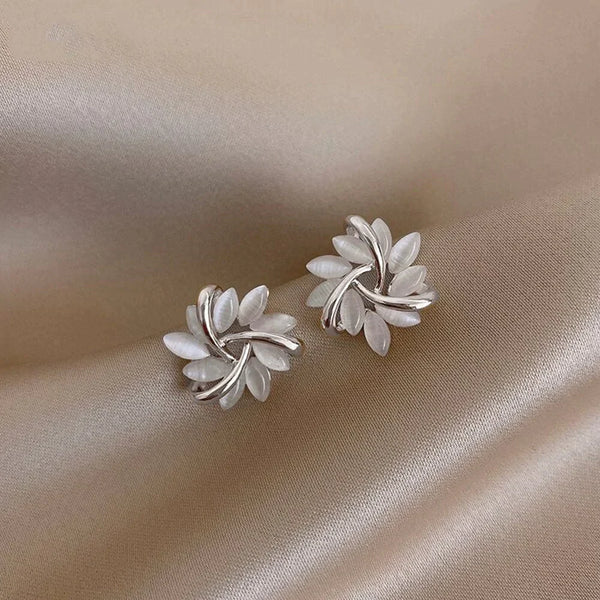 Gold hoop earrings with opal flowers